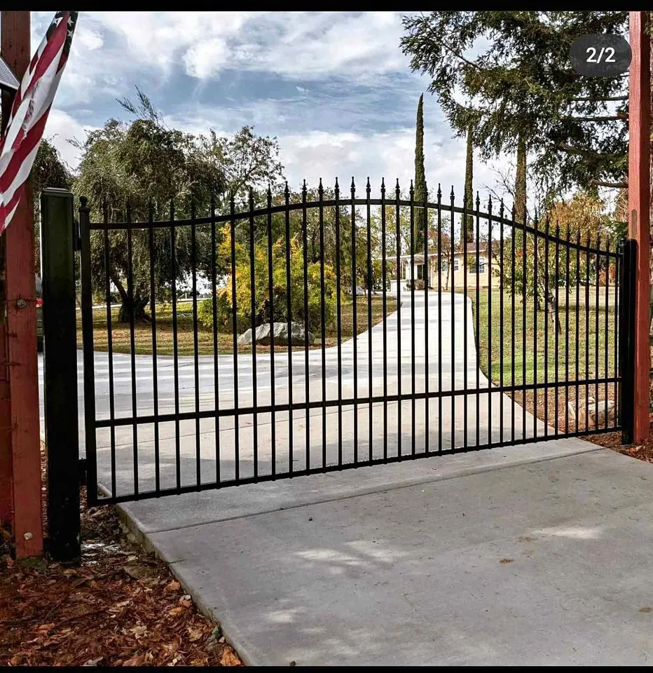 Custom wrought iron driveway gate in black